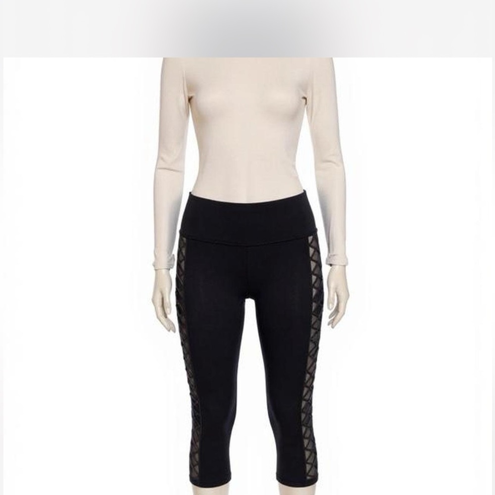 Black cropped lululemon leggings. With mesh detailing. Barely used. Size 8
